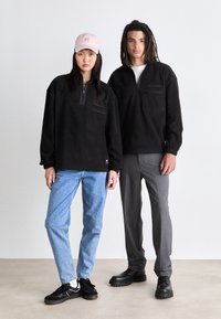 Tommy Jeans ZIP UNISEX - Suéter de forro polar - black