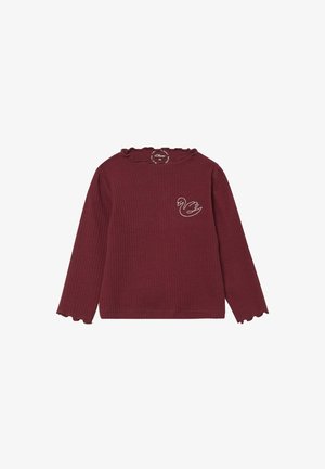 Geripptes bordeauxrotes Langarmoberteil mit Rüschenkragen und -manschetten, verziert mit einer kleinen weißen Schwan-Stickerei auf der linken Brust.