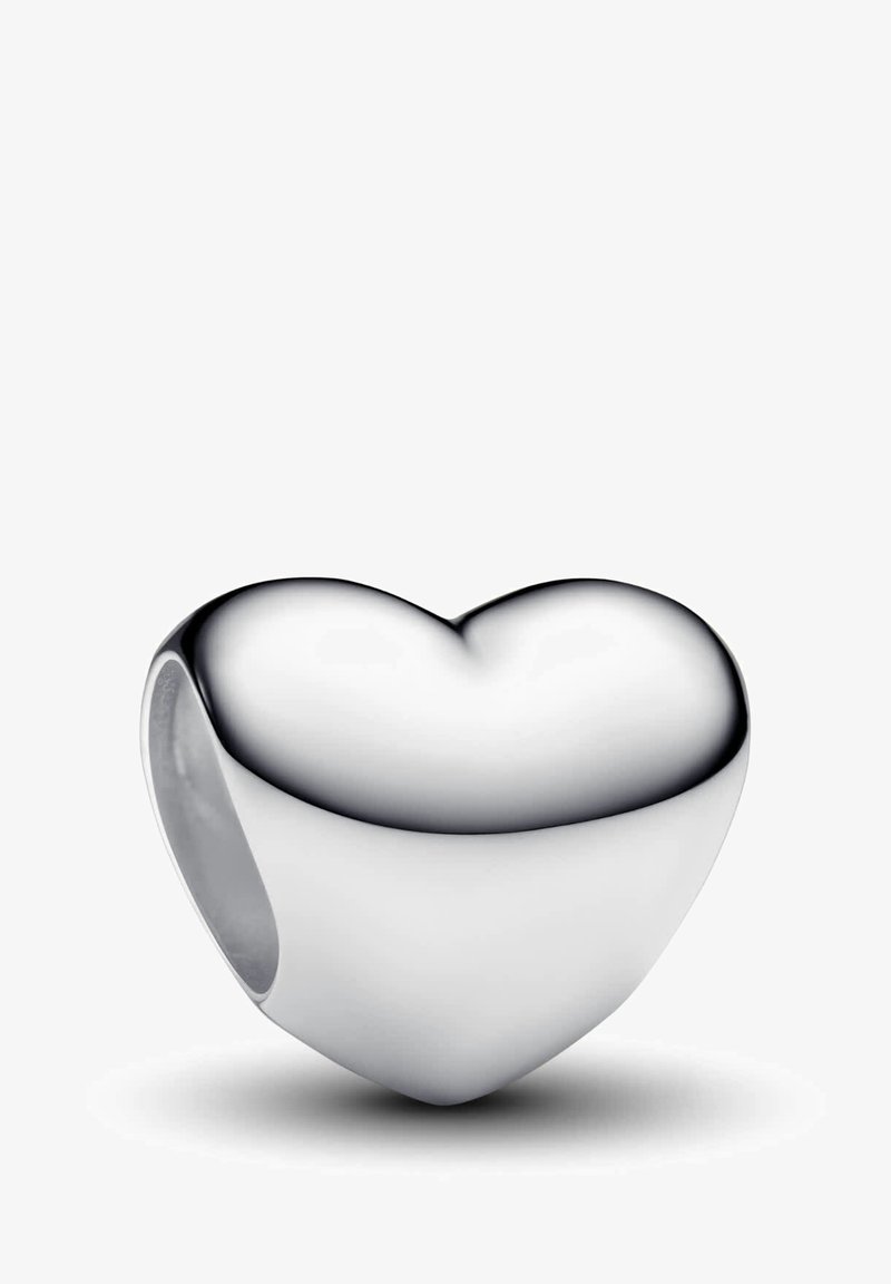 Perla a forma di cuore in argento con superficie lucida e liscia e centro cavo, caratterizzata da bordi arrotondati e finitura lucida.