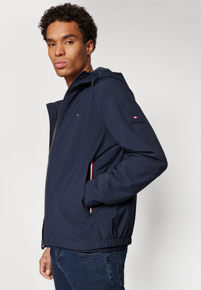 Tommy Hilfiger HOODED JACKET - Summer jacket - desert sky/dark 