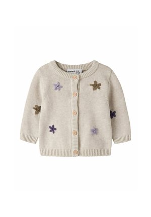 Cardigan pour bébé en tricot beige avec boutons devant et fleurs violettes et marron brodées sur le devant et les manches.