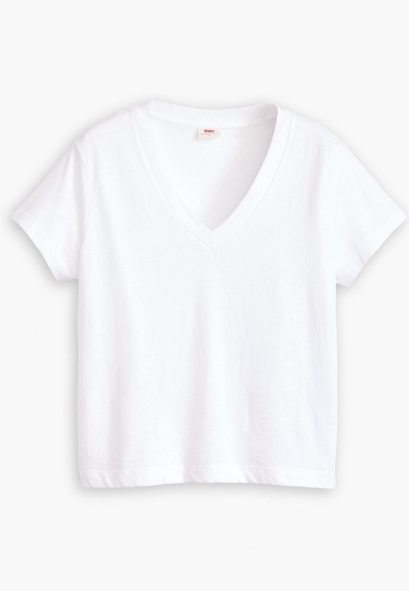 T-shirt blanc uni à manches courtes avec col en V, posé à plat, en tissu léger en coton, avec une petite étiquette de marque à l'intérieur du col.
