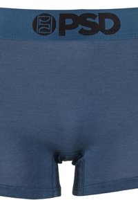 Boxers pour hommes bleus avec une ceinture élastique noire arborant le logo PSD et un emblème circulaire sur la gauche.