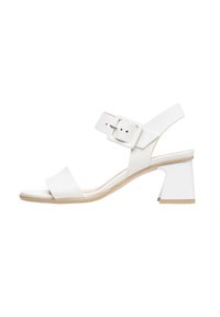 White heeled sandals with a square toe, featuring a wide strap and adjustable ankle buckle. Smooth texture, low block heel.