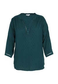 Blouse turquoise avec un col en V, manches trois-quarts et motif texturé. Comprend une patte de boutonnage et un détail découpé aux poignets des manches.