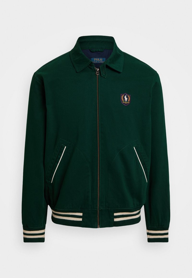 Veste zippée vert foncé avec poignets et ourlet rayés, deux poches obliques et un petit logo Polo Ralph Lauren sur la poitrine.