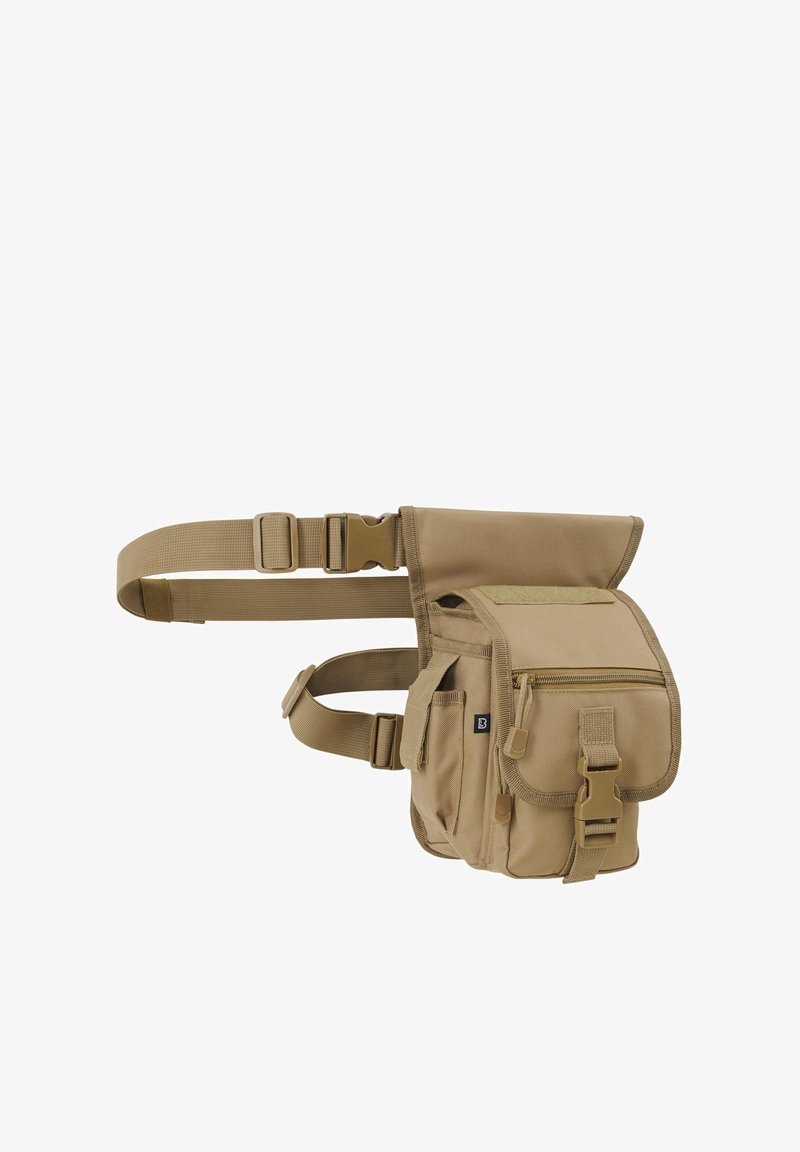 Beež taktikaline vöökott mitme tõmblukuga ja pannalatega taskuga, reguleeritavate rihmade ja vastupidava kangaga.