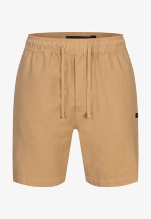 Lyhyet vaaleat shortsit, joissa on joustava vyötärö, naru-tila ja sileä pinta. Sivussa on pieni musta brändilogo.