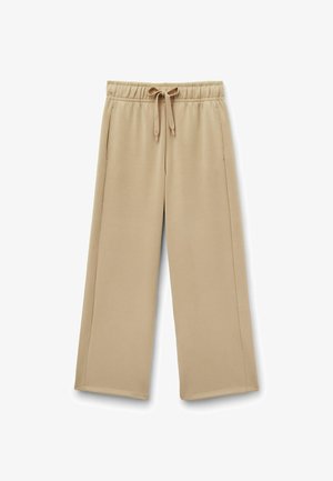 Beige weite Sweathosen mit einem elastischen Bund, verstellbarem Kordelzug und Seitentaschen; weicher Stoff mit glatter Textur.