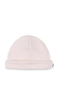 Bonnet en tricot rose clair avec un revers, comportant une étiquette avec le nom de la marque. Tissu doux avec une texture lisse.