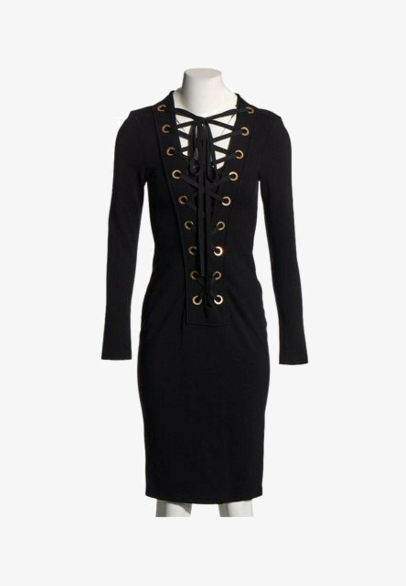 Robe noire à manches longues, longueur genou, col en V profond, œillets dorés et détail à lacets noirs à l'avant.