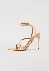 Sandalen met hoge hak - gold