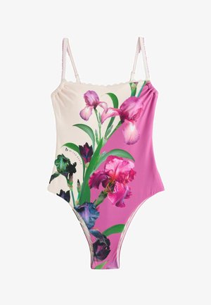 Badedragt i ét stykke med tynde stropper, med pink og cremefarvede blokke og store, levende blomsterprint med grønne blade.