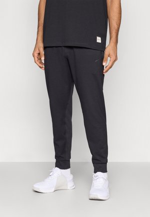 JOGGER - Jogginghose - black