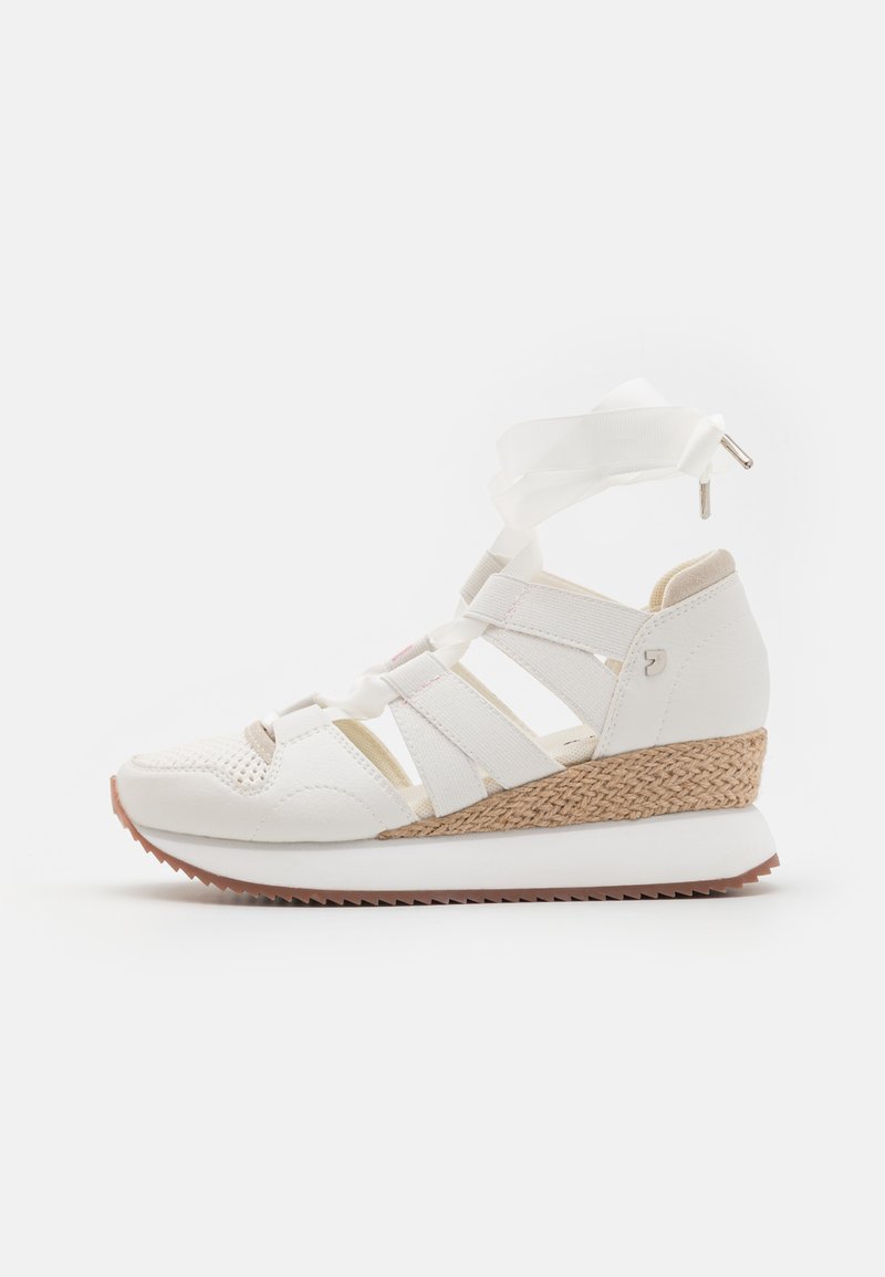 White athletic wedge shoe with woven jute midsole, flat rubber sole, and satin ribbon laces. Breathable mesh and synthetic upper.