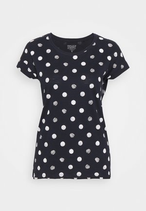 Marineblauw T-shirt met korte mouwen en witte en zilveren metallic polka dots gelijkmatig verspreid over de stof.
