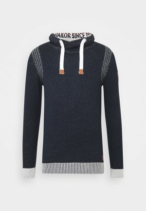 Sudadera con capucha de punto azul marino con cuello vuelto, cordones blancos y detalles en marrón. Presenta puños y dobladillo acanalados con un patrón de rayas en contraste.