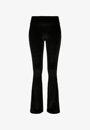 Pantalones acampanados negros en tejido suave de terciopelo. Cintura alta y textura lisa. El diseño presenta un corte acampanado desde la rodilla hacia abajo.