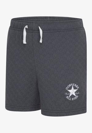 Mørk grå shorts laget av teksturert stoff, med en hvit snor og brodert 'Converse All Star'-logo med stjernesymbol.