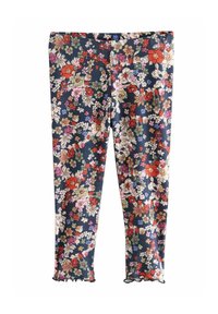 Leggings floreali con base blu navy, caratterizzati da una texture a coste. Il design include fiori multicolori e un orlo arricciato.