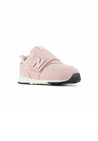 Pink athletic shoe with suede and mesh upper, hook-and-loop strap, padded collar, and black rubber outsole. New Balance logo on the side.
