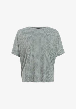 Blouse grise à manches courtes avec une coupe ample et un motif en zigzag dans des tons de gris plus foncés, dotée d'un col rond.