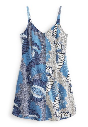 Robe sans manches bleu et blanc avec de grands motifs floraux abstraits et de fines bretelles.