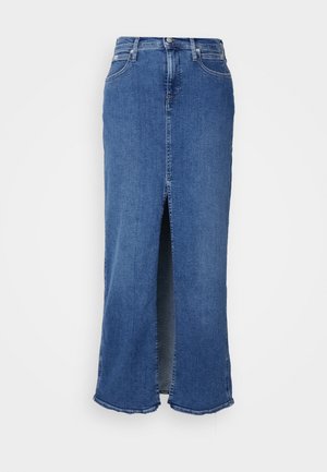 Džínová sukňa v stredne modrej farbe so predným rozparkom, strednej dĺžky, s piatimi vreckami, pútkami na opasok a zaliatym lemom.