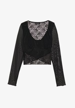 Črni dolg rokav vrh z čipkastim premazom in teksturiranimi mrežastimi rokavi, ki ima globok V-izrezi in plastev dizajnovih poudarkov.