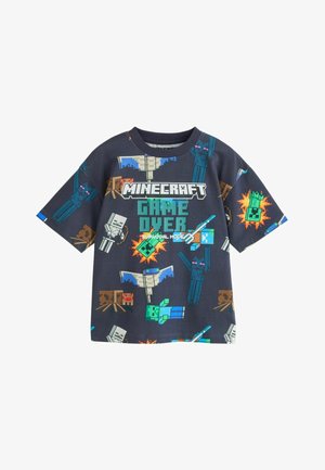 Sötétszürke, Minecraft témájú póló pixeles karakterekkel, "MINECRAFT GAME OVER Survival Mode" felirattal és különféle játékhoz kapcsolódó ikonokkal.