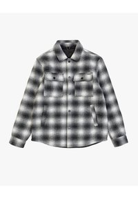Camicia a quadri bianca e nera con chiusura a bottone, due tasche sul petto e maniche lunghe. Il tessuto appare testurizzato con una leggera lucentezza.