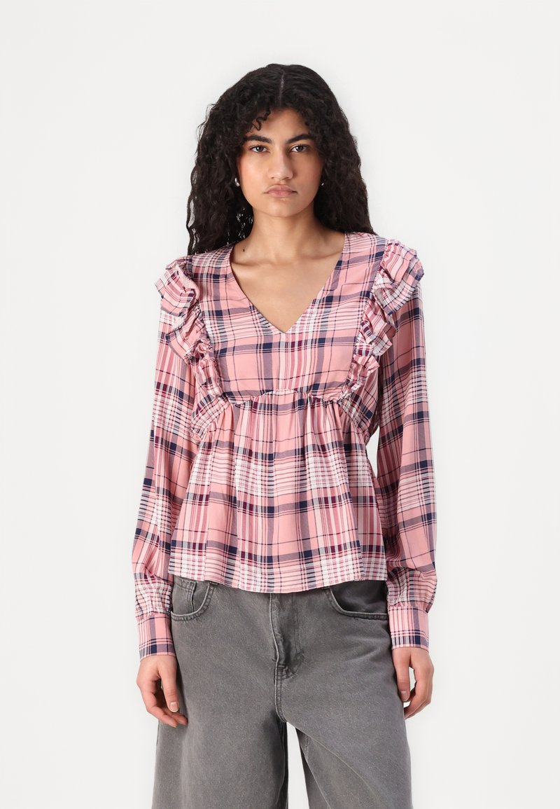 Pink plaid long-sleeve blouse with ruffled edges, V-neckline, and gathered waist. Features a mix of dark blue and white lines.