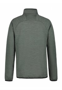 Texturerad grön fleecejacka med ståkrage, långa ärmar och svart fåll. Har subtila mönster och ingen synlig hårdvara.