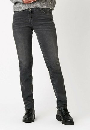 - Jeansy Slim Fit