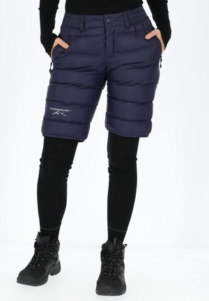 Navy padded shorts with an elastic waistband, featuring zippered pockets and the "Swedemount" logo on the left thigh.