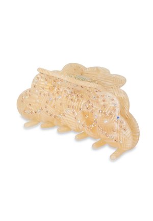 Translucent beige hair claw with a wavy design, textured surface, and embellishments of pink and clear crystals for added detail.
