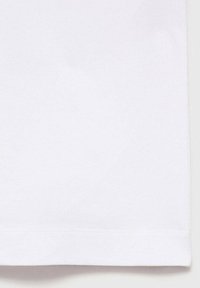 White cotton t-shirt featuring a smooth texture and a straight hem with stitch detailing at the bottom, simple and minimalist design.