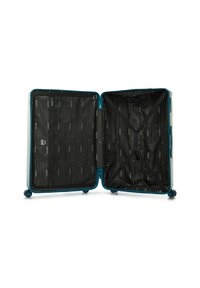 Tvrdý kufr s texturovaným bílým exteriérem a tyrkysovými akcenty. Interiér má černou podšívku s diagonálními pruhy a kompresními popruhy.