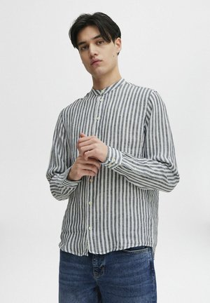 Striped button-up shirt in light blue and white, made from a textured fabric, featuring a band collar and long sleeves.