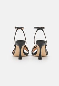 Guess HEATON - Sandali con tacco - black