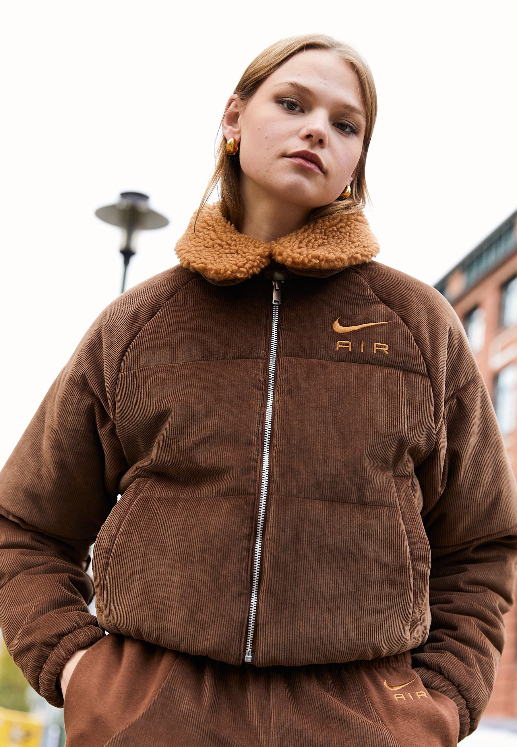 brown jacket nike
