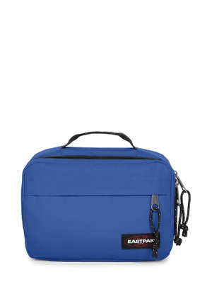 Pochette Eastpak bleue avec poignée noire et deux compartiments zippés, avec patch logo en bas à droite sur le devant.
