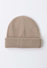 Beanie hat in light brown, ribbed knit texture, rounded top, and folded cuff. Soft material with a simple, seamless design.