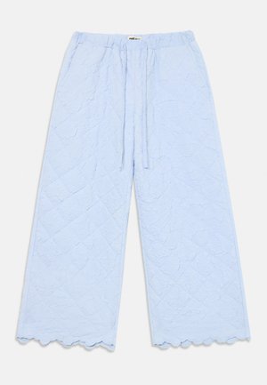 Light blue wide-leg pants made of textured fabric with a quilted appearance; features a drawstring waist and scalloped hem.