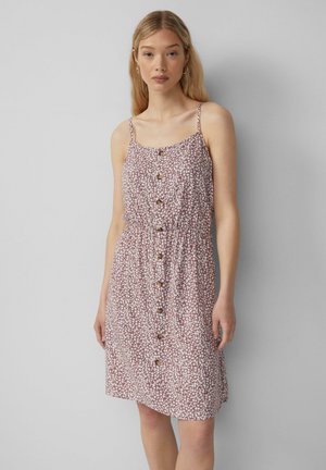 Floral patterned dress in light pink with small white flowers, adjustable spaghetti straps, waistline gathering, and front button closure.