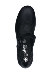 Zapato de cuero negro con punta redondeada, tira elástica y acento de botón decorativo. Presenta una plantilla acolchada marcada como "Antiestrés".
