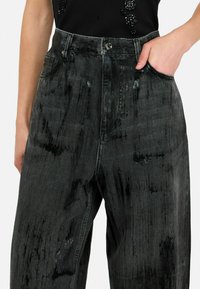 LIU JO MIT BESCHICHTUNG - Wide leg - black