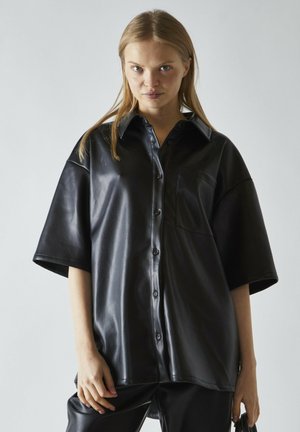 BOXY - Blusa - black pu