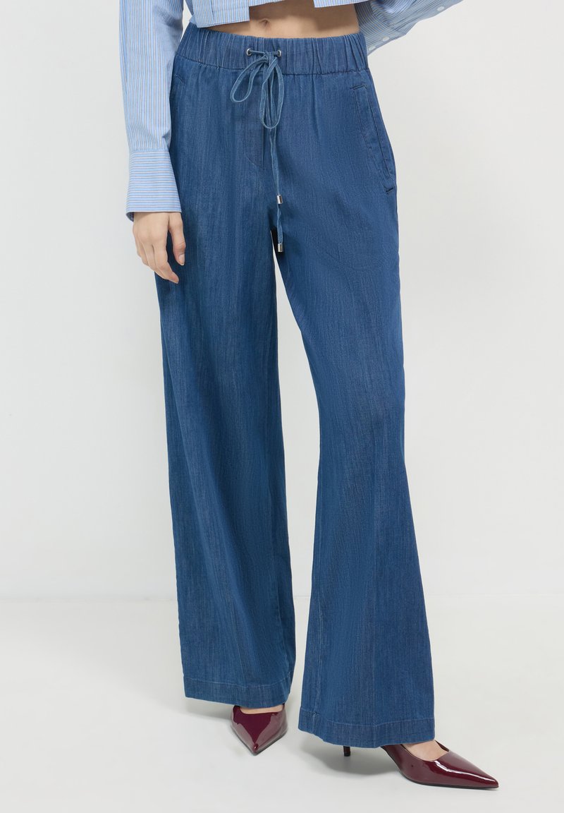 Calliope CON COULISSE - Jeans a zampa - blu denim