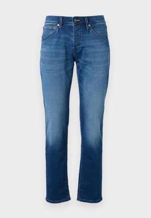 Blue denim jeans with a straight cut, soft texture, five pockets, and a button fly closure. The fabric features a faded wash effect.